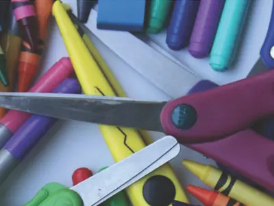 crayons, scissors, markers for fun time at a daycare