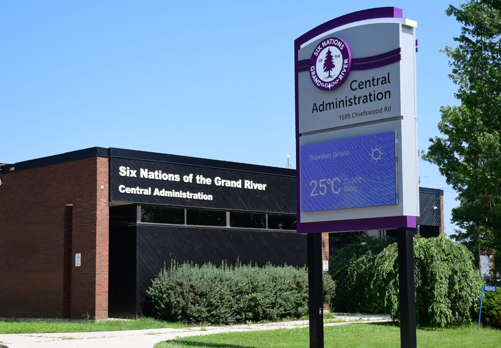Six Nations Administration Building,
STATE OF EMERGENCY DECLARED BY SIX NATIONS OF THE GRAND RIVER - June 26, 2025 OHSWEKEN, ON – The Six Nations of the Grand River Elected Council (SNGREC) has declared a State of Emergency effective June 19, 2025, because of unprecedented rainfall and subsequent community flooding that occurred on June 18, 2025.
The declaration allowed the Six Nations of the Grand River Emergency Control Group (ECG) to assess the immediate damage and deploy resources to mitigate any further impact. This will also allow the ECG to monitor and respond appropriately to any potential weather events.
We encourage all community members who have experienced damage or need assistance to contactthe Crisis Line at (519) 445-2204 (24/7) with the following information: Description of the impact on your property/home.
Are you connected to the public wastewater system or a private system.
Do you have homeowner’s insurance.
Are you currently involved with any community services.